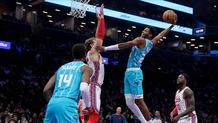 Charlotte Hornets forward Brandon Miller (24) dunks against Brooklyn Nets center Moritz Wagner Charlotte Hornets forward Brandon Miller (24) dunks against Brooklyn Nets center Moritz Wagner