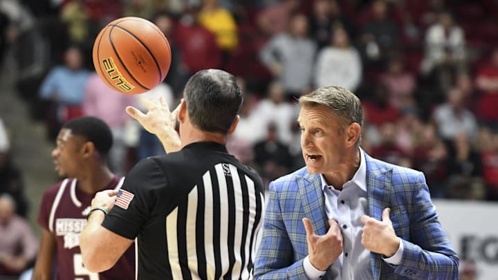 Feb 3, 2024; Tuscaloosa, Alabama, USA; Alabama head coach Nate Oats protests to an official after another official hit him with a technical foul at Coleman Coliseum. Mandatory Credit: Gary Cosby Jr.-Imagn Images Feb 3, 2024; Tuscaloosa, Alabama, USA; Alabama head coach Nate Oats protests to an official after another official hit him with a technical foul at Coleman Coliseum. Mandatory Credit: Gary Cosby Jr.-Imagn Images