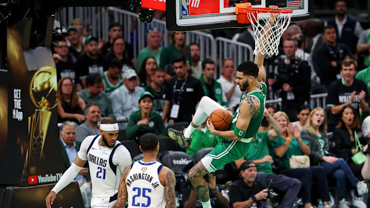 Jun 17, 2024; Boston, Massachusetts, USA; Boston Celtics forward Jayson Tatum (0) dunks the ball against Dallas Mavericks center Daniel Gafford (21) in game five of the 2024 NBA Finals at TD Garden. Mandatory Credit: Peter Casey-Imagn Images Jun 17, 2024; Boston, Massachusetts, USA; Boston Celtics forward Jayson Tatum (0) dunks the ball against Dallas Mavericks center Daniel Gafford (21) in game five of the 2024 NBA Finals at TD Garden. Mandatory Credit: Peter Casey-Imagn Images