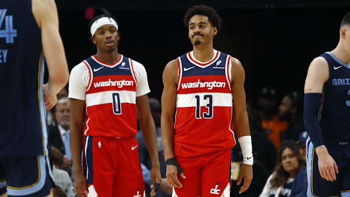 Nov 8, 2024; Memphis, Tennessee, USA; Washington Wizards guard Bilal Coulibaly (0) and guard Jordan Poole (13) react during the first half against the Memphis Grizzlies at FedExForum. Mandatory Credit: Petre Thomas-Imagn Images