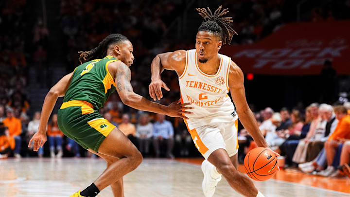 Tennessee guard Chaz Lanier (2) moves past Norfolk State guard Brian Moore Jr. (5) during a college basketball game between Tennessee and Norfolk State held at Thompson-Boling Arena at Food City Center in Knoxville, Tenn., on Tuesday, Dec. 31, 2024.