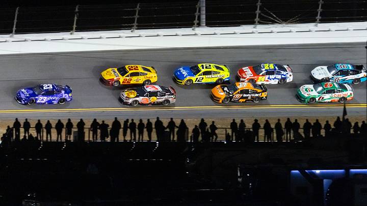 Feb 12, 2026; Daytona Beach, Florida, USA; NASCAR Cup Series driver Bubba Wallace (23) leads Austin Dillon (3), Joey Logano (22), Ryan Blaney (12), Chris Buescher (17), William Byron (24), Brad Keselowski (6) during Duel 1 for the Daytona 500 at Daytona at Daytona International Speedway. Mandatory Credit: Mark J. Rebilas-Imagn Images Feb 12, 2026; Daytona Beach, Florida, USA; NASCAR Cup Series driver Bubba Wallace (23) leads Austin Dillon (3), Joey Logano (22), Ryan Blaney (12), Chris Buescher (17), William Byron (24), Brad Keselowski (6) during Duel 1 for the Daytona 500 at Daytona at Daytona International Speedway. Mandatory Credit: Mark J. Rebilas-Imagn Images