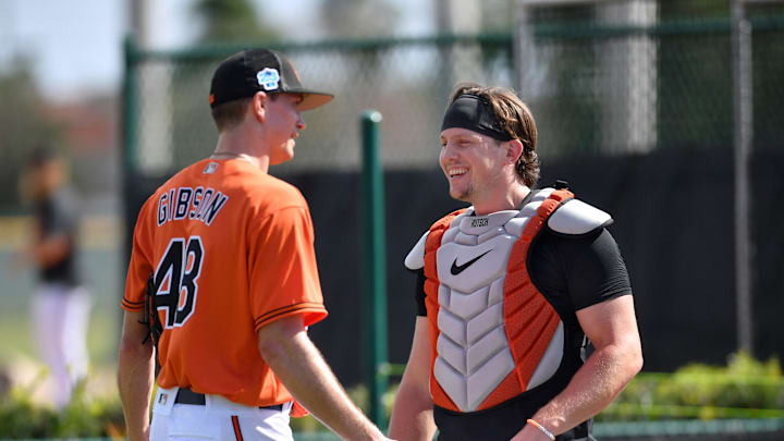Baltimore Orioles starting catcher Adley Rutschman, right, talks with Orioles pitcher Kyle Gibson in Orioles Spring Training in Sarasota, Florida