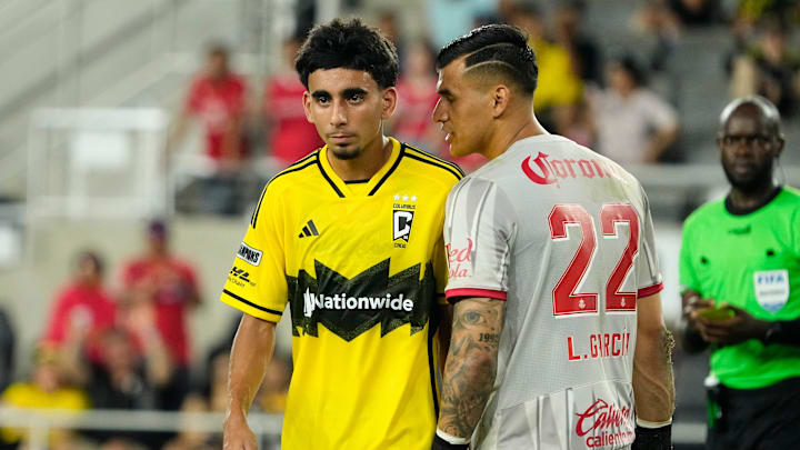 Toluca FC goalkeeper Luis Garcia (22) has words with Columbus Crew midfielder Taha Habroune (16) after Habroune scored a goal during a penalty kick shootout following the second half of the Leagues Cup match against Toluca FC at Lower.com Field in Columbus on July 29, 2025. The Crew lost 4-2 in penalty kicks after a 2-2 draw in regulation.
