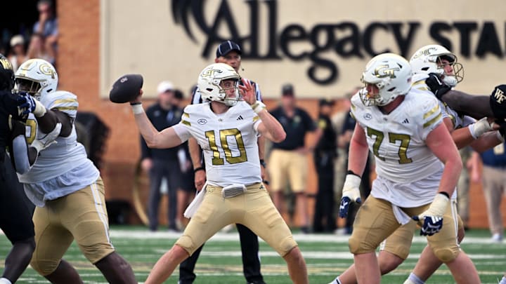 Sep 27, 2025; Winston-Salem, North Carolina, USA; Georgia Tech Yellow Jackets quarterback Haynes King (10) throws a pass during the fourth quarter against the Wake Forest Demon Deacons at Allegacy Federal Credit Union Stadium. Mandatory Credit: Zachary Taft-Imagn Images Sep 27, 2025; Winston-Salem, North Carolina, USA; Georgia Tech Yellow Jackets quarterback Haynes King (10) throws a pass during the fourth quarter against the Wake Forest Demon Deacons at Allegacy Federal Credit Union Stadium. Mandatory Credit: Zachary Taft-Imagn Images