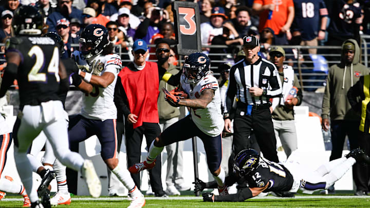 DJ Moore breaks away for a first down after a catch in the Bears' loss to Baltimore, 30-16. DJ Moore breaks away for a first down after a catch in the Bears' loss to Baltimore, 30-16.
