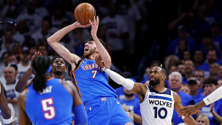 May 28, 2025; Oklahoma City, Oklahoma, USA; Oklahoma City Thunder forward Chet Holmgren (7) shoots the ball against Minnesota Timberwolves guard Mike Conley (10) during the second quarter in game five of the western conference finals for the 2025 NBA Playoffs at Paycom Center. Mandatory Credit: Alonzo Adams-Imagn Images