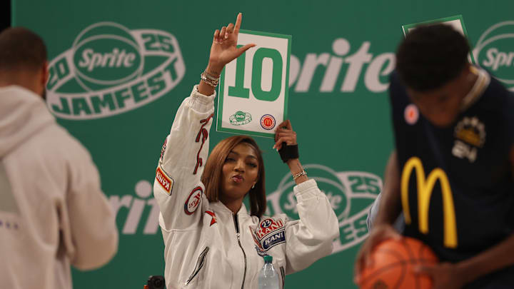Mar 31, 2025; Brooklyn, New York, USA; Chicago Sky forward Angel Reese holds up a score card during the Sprite Jam Fest at Barclay's Center. 