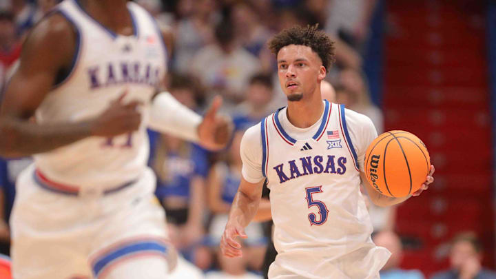 Kansas Jayhawks guard Zeke Mayo (5) dribbles down court in the second half of the game against Washburn inside Allen Fieldhouse Tuesday, Oct. 29, 2024.