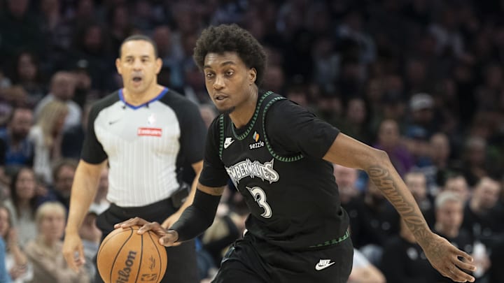Mar 20, 2026; Minneapolis, Minnesota, USA; Minnesota Timberwolves forward Jaden McDaniels (3) dribbles the ball against the Portland Trail Blazers in the second half at Target Center. 