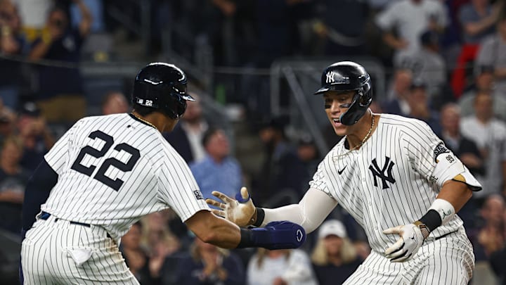 Sep 26, 2024; Bronx, New York, USA; New York Yankees center fielder Aaron Judge (99) celebrates with right fielder Juan Soto (22) after hitting a two run home run during the seventh inning against the Baltimore Orioles at Yankee Stadium. Mandatory Credit: Vincent Carchietta-Imagn Images