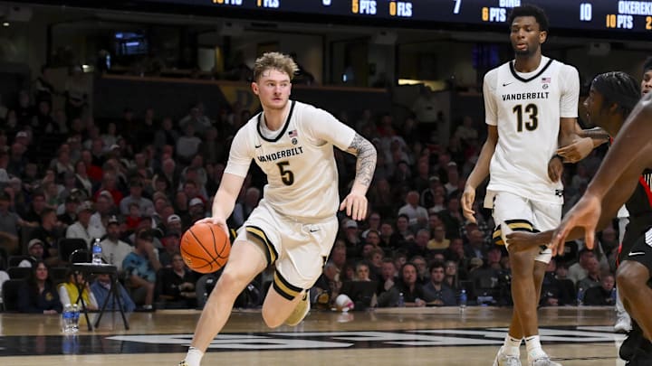 Feb 25, 2026; Nashville, Tennessee, USA;  Vanderbilt Commodores forward Tyler Nickel (5) drives to the basket against the Georgia Bulldogs during the second half at Memorial Gymnasium. Mandatory Credit: Steve Roberts-Imagn Images