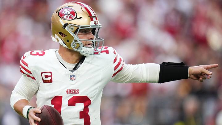 San Francisco 49ers quarterback Brock Purdy (13) scrambles out of the pocket against the Arizona Cardinals at State Farm Stadium in Glendale on Nov. 16, 2025. San Francisco 49ers quarterback Brock Purdy (13) scrambles out of the pocket against the Arizona Cardinals at State Farm Stadium in Glendale on Nov. 16, 2025.