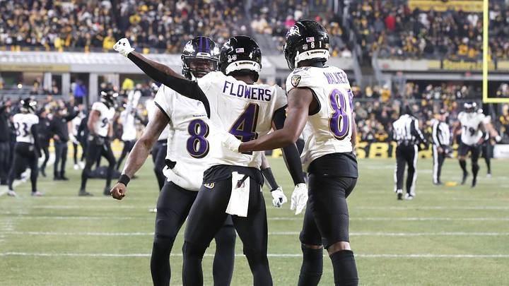Jan 4, 2026; Pittsburgh, Pennsylvania, USA; Baltimore Ravens wide receiver Zay Flowers (4) reacts with  quarterback Lamar Jackson (8) after scoring a touchdown against the Pittsburgh Steelers during the second half at Acrisure Stadium. Mandatory Credit: Charles LeClaire-Imagn Images