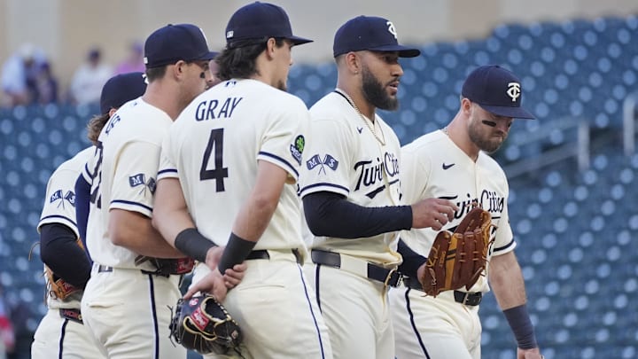 May 13, 2026; Minneapolis, Minnesota, USA; Minnesota Twins shortstop Brooks Lee (22) and third baseman Tristan Gray (4) and starting pitcher Simeon Woods Richardson (24) and first baseman Kody Clemens (2) await the pitching coach in a long first inning against the Miami Marlins at Target Field. Mandatory Credit: Bruce Kluckhohn-Imagn Images May 13, 2026; Minneapolis, Minnesota, USA; Minnesota Twins shortstop Brooks Lee (22) and third baseman Tristan Gray (4) and starting pitcher Simeon Woods Richardson (24) and first baseman Kody Clemens (2) await the pitching coach in a long first inning against the Miami Marlins at Target Field. Mandatory Credit: Bruce Kluckhohn-Imagn Images