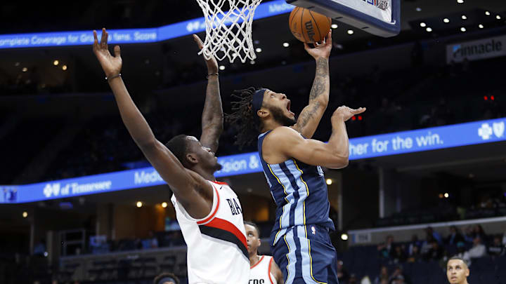 Mar 1, 2024; Memphis, Tennessee, USA; Memphis Grizzlies forward Lamar Stevens (24) shoots as Portland Trail Blazers center Ibou Badji (41) defends during the second half at FedExForum. Mandatory Credit: Petre Thomas-Imagn Images Mar 1, 2024; Memphis, Tennessee, USA; Memphis Grizzlies forward Lamar Stevens (24) shoots as Portland Trail Blazers center Ibou Badji (41) defends during the second half at FedExForum. Mandatory Credit: Petre Thomas-Imagn Images