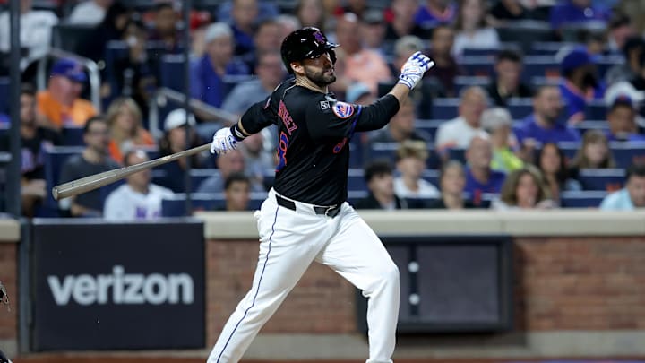 New York Mets designated hitter J.D. Martinez (28) follows through on an RBI single against the Cincinnati Reds during the sixth inning at Citi Field in 2024. New York Mets designated hitter J.D. Martinez (28) follows through on an RBI single against the Cincinnati Reds during the sixth inning at Citi Field in 2024.