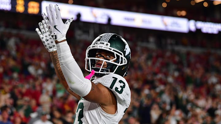 Sep 20, 2025; Los Angeles, California, USA; Michigan State Spartans wide receiver Chrishon McCray (13) celebrates his touchdown scored against the Southern California Trojans during the first half at the Los Angeles Memorial Coliseum. Mandatory Credit: Gary A. Vasquez-Imagn Images