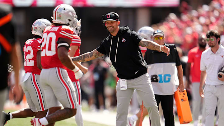 Ohio State Buckeyes linebackers coach James Laurinaitis celebrates with players during the second half of the NCAA football game against the Texas Longhorns at Ohio Stadium on Aug. 30, 2025. Ohio State won 14-7. Ohio State Buckeyes linebackers coach James Laurinaitis celebrates with players during the second half of the NCAA football game against the Texas Longhorns at Ohio Stadium on Aug. 30, 2025. Ohio State won 14-7.
