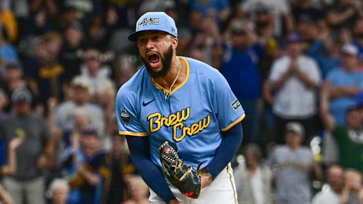Sep 22, 2024; Milwaukee, Wisconsin, USA; Milwaukee Brewers pitcher Devin Williams (38) reacts after picking up a save in the ninth inning against the Arizona Diamondbacks at American Family Field. Mandatory Credit: Benny Sieu-Imagn Images Sep 22, 2024; Milwaukee, Wisconsin, USA; Milwaukee Brewers pitcher Devin Williams (38) reacts after picking up a save in the ninth inning against the Arizona Diamondbacks at American Family Field. Mandatory Credit: Benny Sieu-Imagn Images