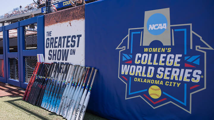 Jun 1, 2025; Oklahoma City, OK, USA;  Tennessee Lady Volunteers bats lined up next to the dugout before the game against the UCLA Bruins in the NCAA Softball Women's College World Series at Devon Park. Mandatory Credit: Brett Rojo-Imagn Images