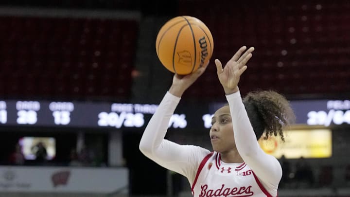 Wisconsin guard Destiny Howell (1) attempts a three-point basket during overtime in their game Sunday, January 18, 2026 at the Kohl Center in Madison, Wisconsin. Wisconsin beat beat Oregon 94-92 in double overtime.