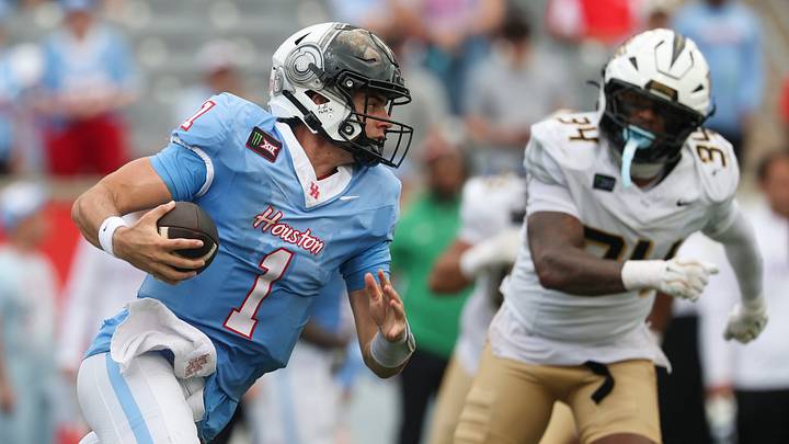 Oct 3, 2026; Houston, Texas, USA; Houston Cougars quarterback Conner Weigman (1) runs with the ball during the fourth quarter against the UCF Knights at TDECU Stadium. Mandatory Credit: Troy Taormina-Imagn Images
