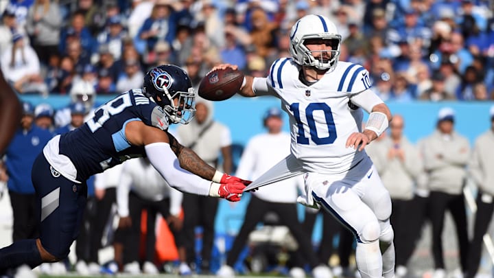 Dec 3, 2023; Nashville, Tennessee, USA; Indianapolis Colts quarterback Gardner Minshew (10) escapes