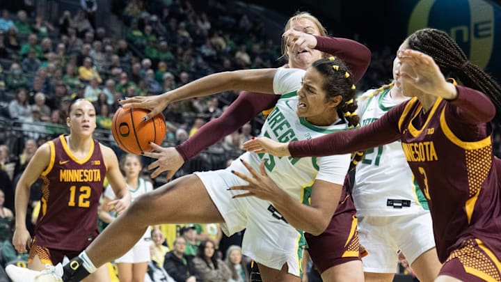Oregon’s Ehis Etute, center, battles Minnesota’s Brylee Glenn, left, Sophie Hart and Amaya Battle for a rebound during the second half at Matthew Knight Arena in Eugene Jan. 21, 2026. Oregon’s Ehis Etute, center, battles Minnesota’s Brylee Glenn, left, Sophie Hart and Amaya Battle for a rebound during the second half at Matthew Knight Arena in Eugene Jan. 21, 2026.
