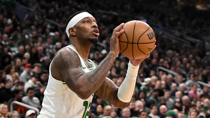 Feb 12, 2025; Boston, Massachusetts, USA; Boston Celtics forward Torrey Craig (12) takes a three-point basket against the San Antonio Spurs during the second quarter at the TD Garden. Mandatory Credit: Brian Fluharty-Imagn Images