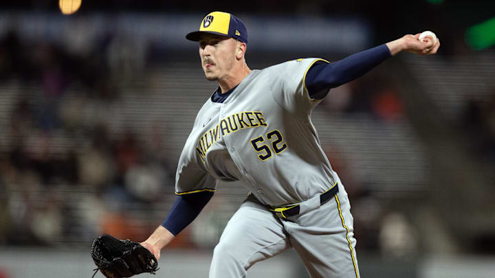 Apr 22, 2025; San Francisco, California, USA; Milwaukee Brewers pitcher Bryan Hudson (52) delivers a pitch against the San Francisco Giants during the eighth inning at Oracle Park. Mandatory Credit: D. Ross Cameron-Imagn Images