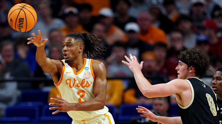 Mar 20, 2025; Lexington, KY, USA; Tennessee Volunteers guard Chaz Lanier (2) passes the ball against Wofford Terriers guard Jackson Sivills (0) during the second half in the first round of the NCAA Tournament at Rupp Arena. Mandatory Credit: Jordan Prather-Imagn Images Mar 20, 2025; Lexington, KY, USA; Tennessee Volunteers guard Chaz Lanier (2) passes the ball against Wofford Terriers guard Jackson Sivills (0) during the second half in the first round of the NCAA Tournament at Rupp Arena. Mandatory Credit: Jordan Prather-Imagn Images