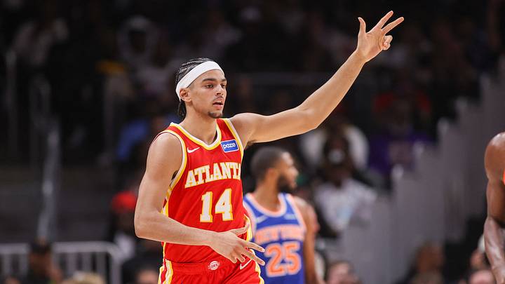 Dec 27, 2025; Atlanta, Georgia, USA; Atlanta Hawks forward Asa Newell (14) reacts after a three-point basket against the New York Knicks in the second quarter at State Farm Arena. Mandatory Credit: Brett Davis-Imagn Images Dec 27, 2025; Atlanta, Georgia, USA; Atlanta Hawks forward Asa Newell (14) reacts after a three-point basket against the New York Knicks in the second quarter at State Farm Arena. Mandatory Credit: Brett Davis-Imagn Images