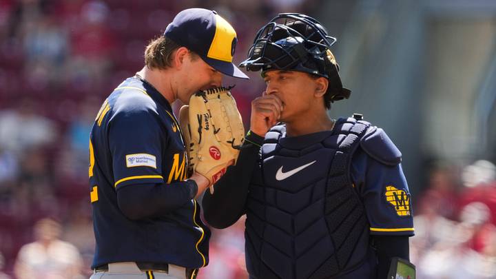 Sep 6, 2026; Cincinnati, Ohio, USA;  Milwaukee Brewers pitcher Kyle Harrison talks with catcher Bo Naylor during the game against the Cincinnati Reds in the second inning at Great American Ball Park. Mandatory Credit: Aaron Doster-Imagn Images