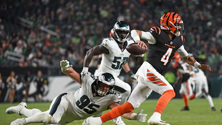 Aug 7, 2025; Philadelphia, Pennsylvania, USA; Cincinnati Bengals quarterback Desmond Ridder (4) is pressured by Philadelphia Eagles defensive tackle Ty Robinson (95) during the third quarter at Lincoln Financial Field. Mandatory Credit: Eric Hartline-Imagn Images Aug 7, 2025; Philadelphia, Pennsylvania, USA; Cincinnati Bengals quarterback Desmond Ridder (4) is pressured by Philadelphia Eagles defensive tackle Ty Robinson (95) during the third quarter at Lincoln Financial Field. Mandatory Credit: Eric Hartline-Imagn Images