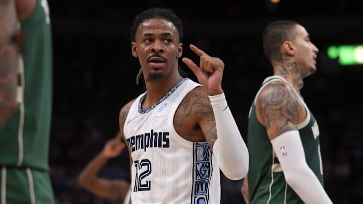 Dec 26, 2025; Memphis, Tennessee, USA; Memphis Grizzlies guard Ja Morant (12) gestures during the third quarter against the Milwaukee Bucks at FedExForum. Mandatory Credit: Petre Thomas-Imagn Images