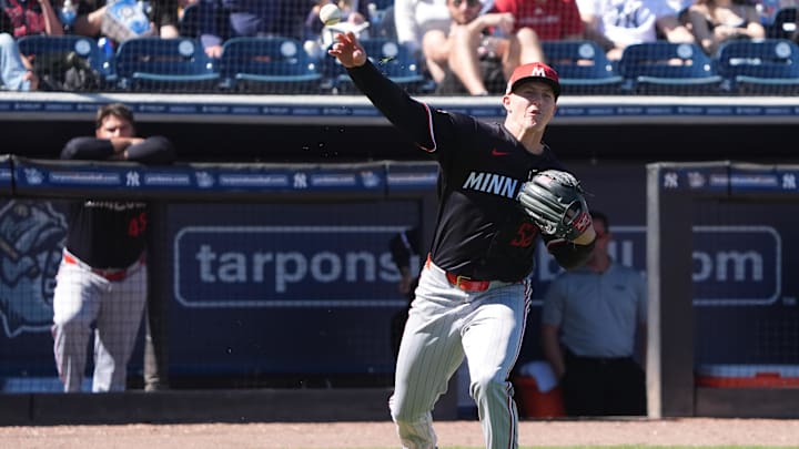 Mar 6, 2025; Tampa, Florida, USA; Minnesota Twins pitcher Zebby Matthews (52) throws out New York Yankees first base Paul Goldschmidt (48) at first base during the fourth inning at George M. Steinbrenner Field.