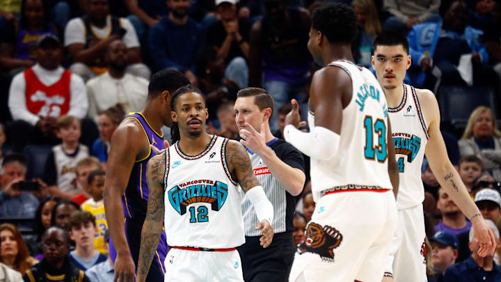 Mar 29, 2025; Memphis, Tennessee, USA; Memphis Grizzlies guard Ja Morant (12) reacts with forward Jaren Jackson Jr. (13) during the first quarter against the Los Angeles Lakers at FedExForum. Mandatory Credit: Petre Thomas-Imagn Images Mar 29, 2025; Memphis, Tennessee, USA; Memphis Grizzlies guard Ja Morant (12) reacts with forward Jaren Jackson Jr. (13) during the first quarter against the Los Angeles Lakers at FedExForum. Mandatory Credit: Petre Thomas-Imagn Images