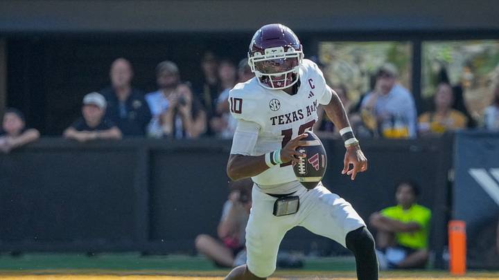 Oct 10, 2026; Columbia, Missouri, USA; Texas A&M Aggies quarterback Marcel Reed (10) scrambles in the backfield against the Missouri Tigers during the second half of the game at Faurot Field at Memorial Stadium. Mandatory Credit: Denny Medley-Imagn Images Oct 10, 2026; Columbia, Missouri, USA; Texas A&M Aggies quarterback Marcel Reed (10) scrambles in the backfield against the Missouri Tigers during the second half of the game at Faurot Field at Memorial Stadium. Mandatory Credit: Denny Medley-Imagn Images