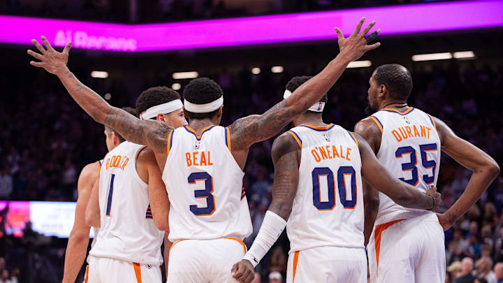 Apr 12, 2024; Sacramento, California, USA; Phoenix Suns guard Grayson Allen (8) and guard Devin Booker (1) and guard Bradley Beal (3) and forward Royce O'Neale (00) and forward Kevin Durant (35) huddle up before the final seconds of the fourth quarter at Golden 1 Center. Mandatory Credit: Ed Szczepanski-Imagn Images Apr 12, 2024; Sacramento, California, USA; Phoenix Suns guard Grayson Allen (8) and guard Devin Booker (1) and guard Bradley Beal (3) and forward Royce O'Neale (00) and forward Kevin Durant (35) huddle up before the final seconds of the fourth quarter at Golden 1 Center. Mandatory Credit: Ed Szczepanski-Imagn Images