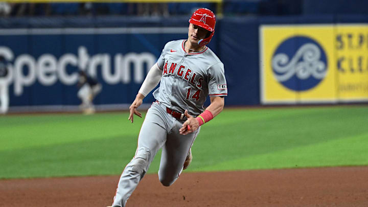 Apr 17, 2024; St. Petersburg, Florida, USA; Los Angeles Angels catcher Logan O’Hoppe (14) rounds third base on his way to scoring a run in the sixth inning against the Tampa Bay Rays  at Tropicana Field. Mandatory Credit: Jonathan Dyer-Imagn Images