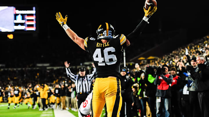 Nov 25, 2016; Iowa City, IA, USA; Iowa Hawkeyes tight end George Kittle (46) celebrates after a touchdown catch during the second half against the Nebraska Cornhuskers at Kinnick Stadium. Mandatory Credit: Jeffrey Becker-Imagn Images