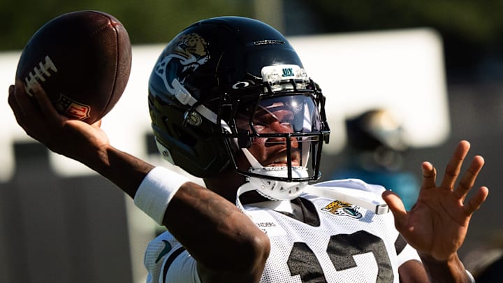 Jacksonville Jaguars wide receiver Travis Hunter (12) throws the ball during a drill at an NFL training camp fourth session at the Miller Electric Center, Sunday, July 27, 2025, in Jacksonville, Fla. [Doug Engle/Florida Times-Union]