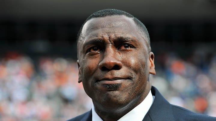 September 20, 2009; Denver, CO, USA;  Former Denver Broncos tight end Shannon Sharpe (84) reacts during the ring of fame ceremony at half time against the Cleveland Browns at Invesco Field. The Broncos defeated the Browns 27-6. Mandatory Credit: Ron Chenoy-Imagn Images