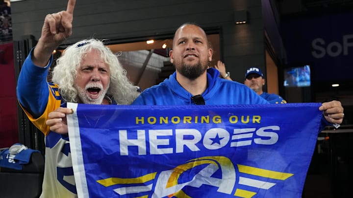 Fans watch from the stands as the Los Angeles Rams take on the Minnesota Vikings during their playoff game at State Farm Stadium on Jan. 13, 2025, in Glendale. Fans watch from the stands as the Los Angeles Rams take on the Minnesota Vikings during their playoff game at State Farm Stadium on Jan. 13, 2025, in Glendale.