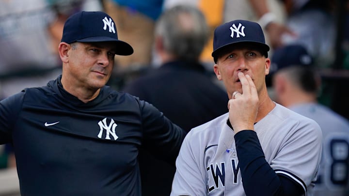 Jul 22, 2022; Baltimore, Maryland, USA; New York Yankees hitting coach Dillon Lawson (74) stands with manager Aaron Boone (17) before the game against the Baltimore Orioles at Oriole Park at Camden Yards. Mandatory Credit: Tommy Gilligan-Imagn Images Jul 22, 2022; Baltimore, Maryland, USA; New York Yankees hitting coach Dillon Lawson (74) stands with manager Aaron Boone (17) before the game against the Baltimore Orioles at Oriole Park at Camden Yards. Mandatory Credit: Tommy Gilligan-Imagn Images
