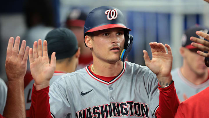 Sep 10, 2025; Miami, Florida, USA; Washington Nationals third baseman Brady House (55) celebrates after scoring against the Miami Marlins during the third inning at loanDepot Park. Mandatory Credit: Sam Navarro-Imagn Images