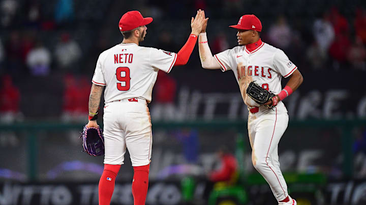 May 6, 2025; Anaheim, California, USA; Los Angeles Angels shortstop Zach Neto (9) and center fielder Kyren Paris (19) celebrate the victory against the Toronto Blue Jays at Angel Stadium. Mandatory Credit: Gary A. Vasquez-Imagn Images
