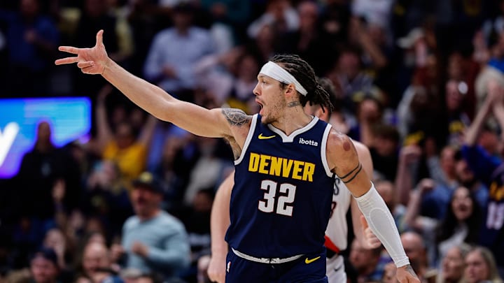 Apr 6, 2026; Denver, Colorado, USA; Denver Nuggets forward Aaron Gordon (32) reacts after a play in overtime against the Portland Trail Blazers at Ball Arena.