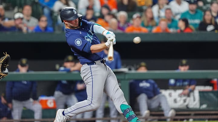  Seattle Mariners first baseman Ty France (23) hits an RBI double against the Baltimore Orioles during the seventh inning at Oriole Park at Camden Yards in 2024.